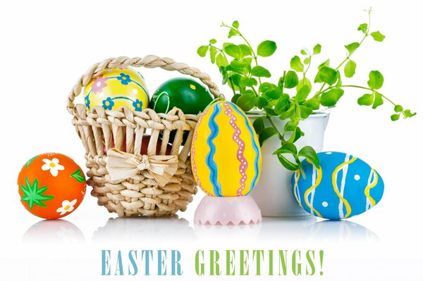 Kosz z farbkami wielkanocnymi